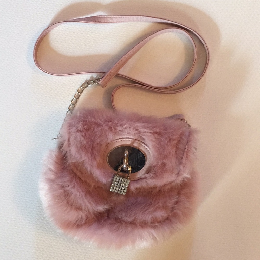Purse. Faux fur with 50” strap from Clair’s. Pink